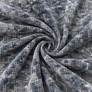 Blauer Velours Möbelstoff aus englischer Manufaktur in Spiralform