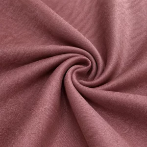 Altrosa Polsterstoff als elegante Stoffspirale