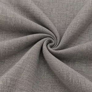 Hellanthrazit Polsterstoff aus englischem Manufakturstoff als Spirale drapiert